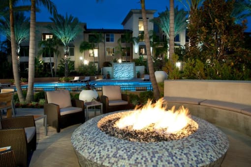 A fire pit sits in the middle of a patio at Circa 37 Apartments, San Diego, CA